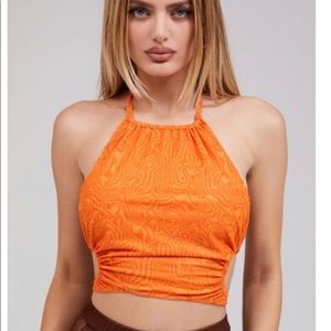 Orange mistress rocks Medium top.
